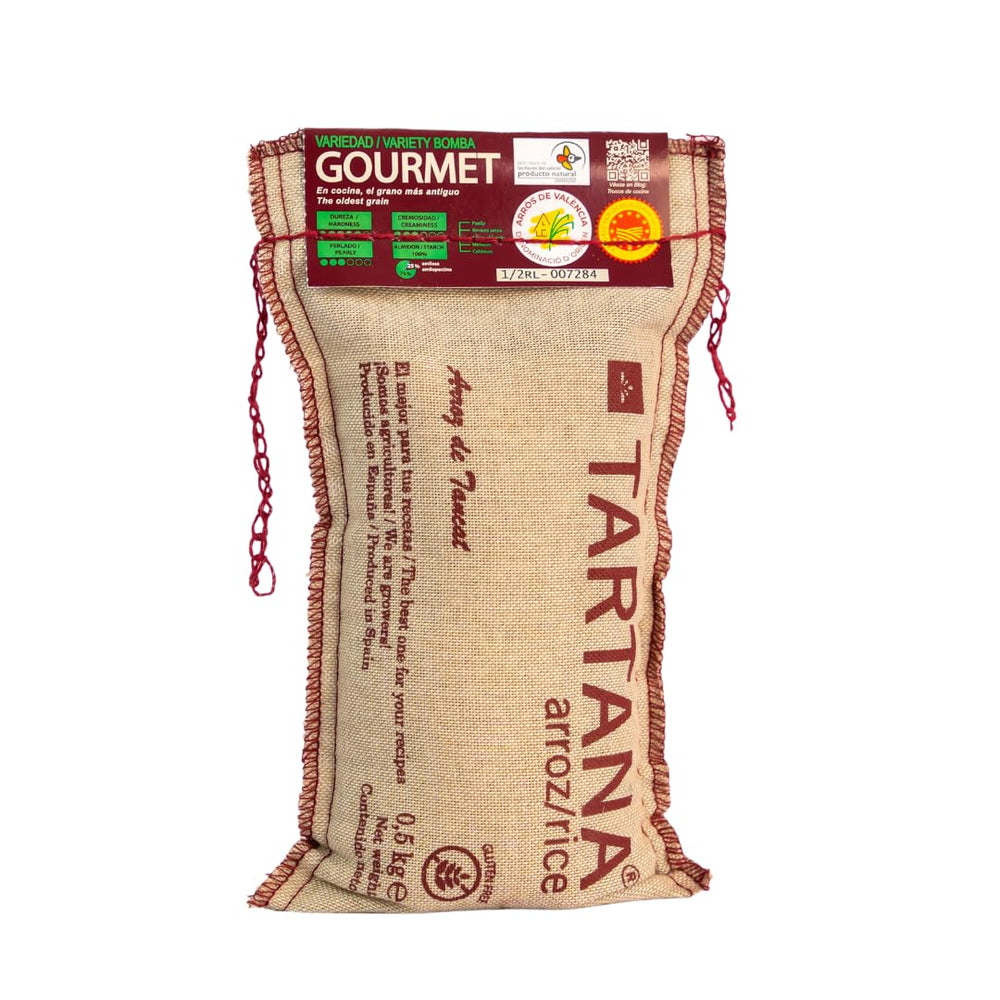 TARTANA Bomba rice bag label showing premium Valencia origin for paella readiness.