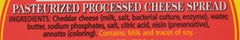 Tastee Jamaican Cheese block sliced, ready to melt on sandwiches.