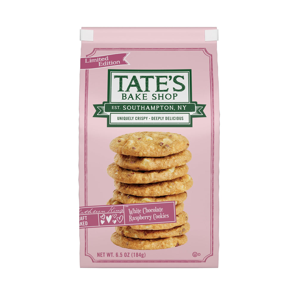 Tate's White Chocolate Raspberry Cookies pack on a wooden board, showing crisp edges.