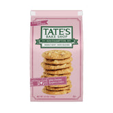Tate's White Chocolate Raspberry Cookies pack on a wooden board, showing crisp edges.