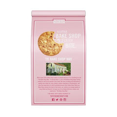 Tate's White Chocolate Raspberry Cookies on a dessert plate, ideal with coffee.