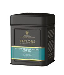 Taylors of Harrogate Afternoon Darjeeling tin cover highlights premium whole leaves for a refined cup.
