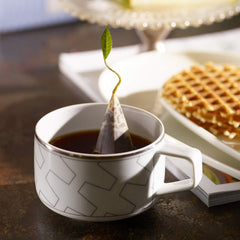 Tea Forte Early Grey tea with citrus notes and smooth finish