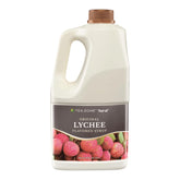 Tea Zone Lychee Syrup 64oz bottle pour for precise dispensing in beverages.