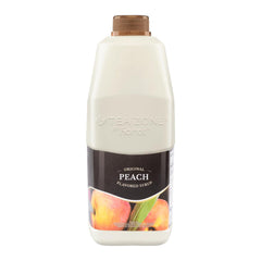 Tea Zone Peach Syrup being poured into a glass for beverages.