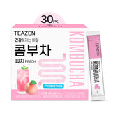 TEAZEN Peach Kombucha packet dissolving quickly for on-the-go hydration.