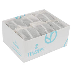 Teazzers green tea bags pack close-up, premium quality for cafés.