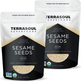 Terrasoul Organic hulled sesame seeds pour into a bowl for tahini or baking