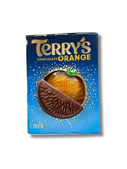 Terry's Chocolate Orange milk chocolate close-up—creamy texture with real orange flavor.