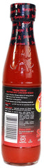 Pouring Texas Pete Hotter Hot Sauce adds tangy heat to wings tacos and more.