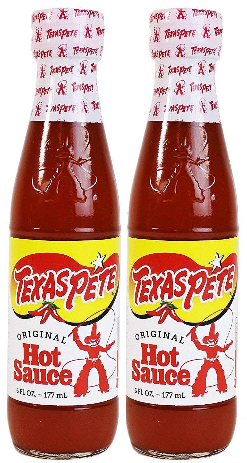 Texas Pete Original Hot Sauce bottle pour adds bold flavor to eggs and burgers.