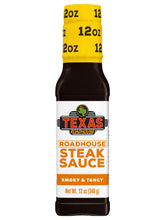 Texas Roadhouse Gold Sauce bottle pouring smoky-sweet glaze over steak