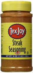 TexJoy steak seasoning bottle ready to season beef before grilling.