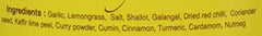 Thai yellow curry sauce simmer with Mae Ploy in a pan