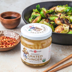 The Ginger People organic grated ginger in brine image highlights ready-to-use ingredients for menus.