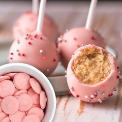 Cake decorating with The Hampton Candy Company pink melts adds vibrant color.