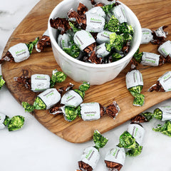 The Hampton Candy Company holiday candy bowl display featuring holiday-coded mints for festive moments