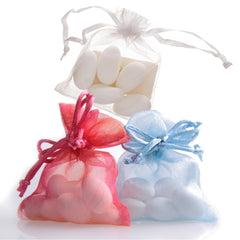 The Hampton Candy Company White Jordan Almonds displayed in a glass bowl for a festive setup.