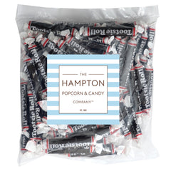 Close-up of a 3-inch Tootsie Roll, nostalgic chocolate treat.