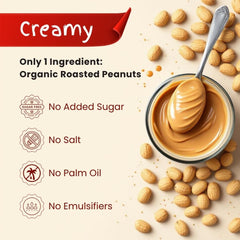 Spoon dipping into The Holly Tree Organic Peanut Butter reveals rich, nutty aroma.