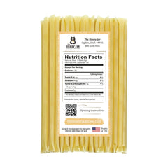 The Honey Jar vanilla sticks opened, ready to drizzle over beverages or snacks.