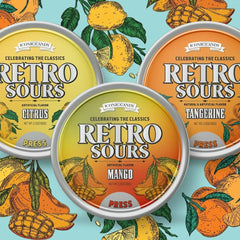 The Penny Candy Store Retro Sours tins for snacking and sharing, with tangy fruity flavors.