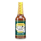 The Pepper Plant chunky garlic hot sauce bottle showing garlic pieces for tacos and eggs
