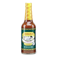 The Pepper Plant chunky garlic hot sauce bottle showing garlic pieces for tacos and eggs