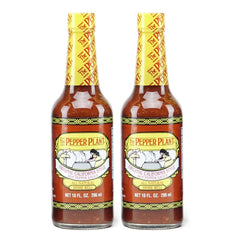 The Pepper Plant Original California Style Hot Pepper Sauce bottles ready to spice up meals.
