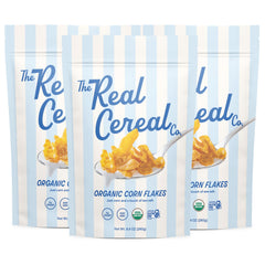 The Real Cereal Company Organic Corn Flakes 3-pack on packaging, crisp and convenient.