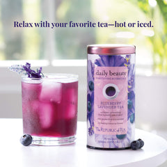 Glass of violet-hued Beautifying Botanicals iced tea ready to enjoy