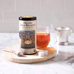 A brewed Assam tea in a cup with amber color