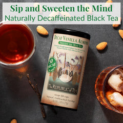 The Republic of Tea decaf vanilla almond tea bag steeping in hot water.