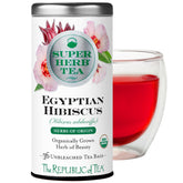 The Republic of Tea Egyptian Hibiscus SuperHerb Tea Tin highlights biodynamic origins and flavor.
