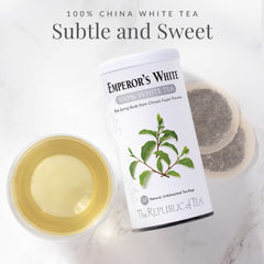 The Republic of Tea Emperor's White Tea tin side panel highlights zero sugar and carb-free.