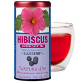 The Republic of Tea Hibiscus Blueberry Superflower tin front view with vibrant berry aroma for relaxing moments