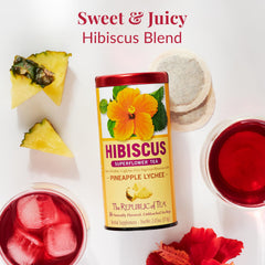 The Republic of Tea Pineapple Lychee Hibiscus packaging highlights a round natural tea bag.
