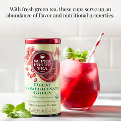 Close-up of The Republic of Tea green tea leaves with pomegranate notes for aroma.