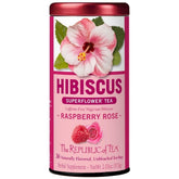 The Republic of Tea Raspberry Rose Hibiscus Tea tin with vibrant fruit and floral aroma.