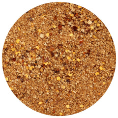 The Spice Lab Ghost Pepper Salt jar closeup reveals pure sea salt grains.