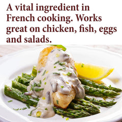 The Spice Way Tarragon Leaves loose leaves on a spoon, ideal for dressings and vinaigrettes.