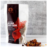 The Sugar Lab Belgian Brown Rock Sugar bottle shows translucent crystals ideal for tea garnishes and premium flavor