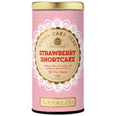 The Republic of Tea Strawberry Shortcake cuppa cake tea bag on a saucer for a cozy moment.