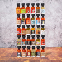 Thoughtfully Gourmet smoky bourbon hot sauce bottle, adds rich depth to wings.