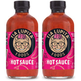 TIA LUPITA hot sauce bottle front view, smoky-sweet medium heat for meals