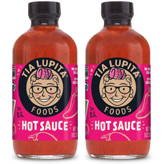 TIA LUPITA hot sauce bottle front view, smoky-sweet medium heat for meals