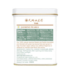Tian Hu Shan high-mountain green tea leaves revealed in the cup.