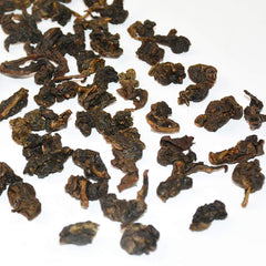 Deep roasted oolong color in a full-bodied cup.