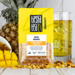 Tiesta Tea Maui Mango dry leaf closeup with vibrant mango and hibiscus notes.
