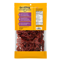 Tillamook Country Smoker beef jerky close-up shows crushed red pepper seasoning and kick